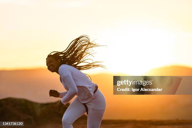 portrait of a brazilian woman from capoeira - berimbau stock pictures, royalty-free photos & images