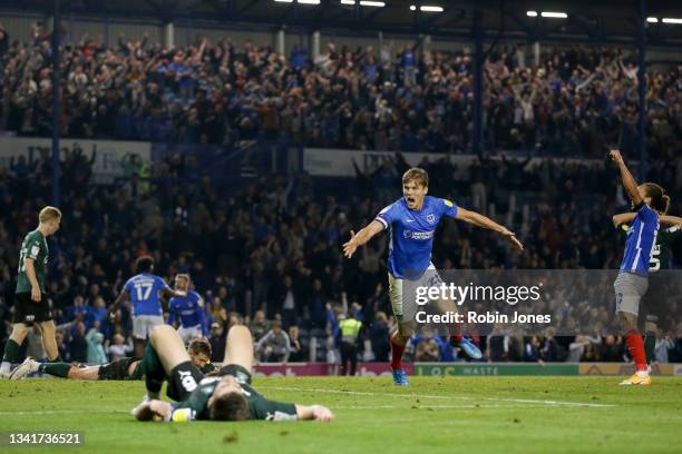 Sean Raggett of Portsmouth FC celebrates after scoring equaliser to make it 2-2 during the Sky Bet League One match between Portsmouth and Plymouth...