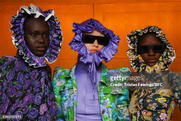 Models backstage ahead of the Richard Quinn show during London Fashion Week September 2021 on September 21, 2021 in London, England.