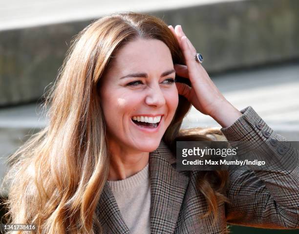 Catherine, Duchess of Cambridge embarks on a boat trip, on Lake Windermere, with two of the 'Windermere Children', a group of 300 child Holocaust...