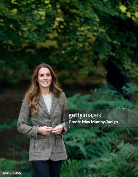 Catherine, Duchess of Cambridge arrives to embark on a boat trip, on Lake Windermere, with two of the 'Windermere Children', a group of 300 child...