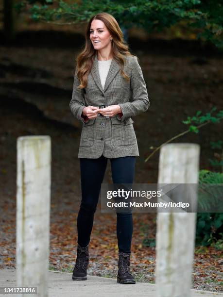 Catherine, Duchess of Cambridge arrives to embark on a boat trip, on Lake Windermere, with two of the 'Windermere Children', a group of 300 child...