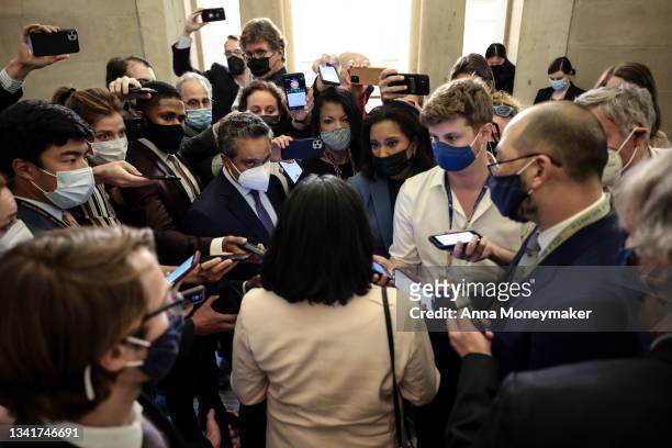 Rep. Pramila Jayapal is swarmed by reporters after a meeting with House Speaker Nancy Pelosi in her office in the U.S. Capitol Building on September...