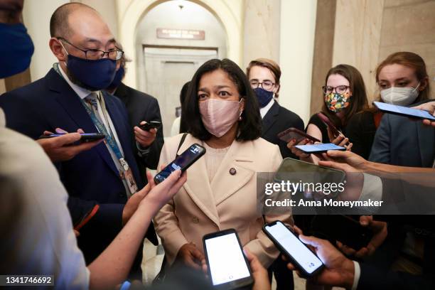 Rep. Pramila Jayapal waks towards reporters after a meeting with House Speaker Nancy Pelosi's in her office in the U.S. Capitol Building on September...