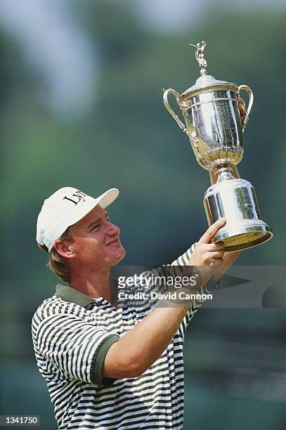 Ernie Els of South Africa lifts the trophy after victory in the US Open at Oakmont Country Club in Pennsylvania, USA on June 20, 1994.
