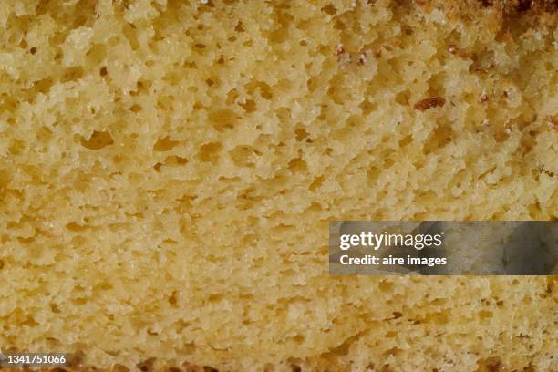 close-up view of the delicious and fluffy vanilla sponge cake - kuchenboden stock-fotos und bilder