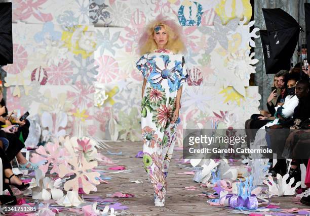 Model walks the runway at the VIN + OMI show during London Fashion Week September 2021 on September 21, 2021 in London, England.