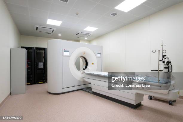 a ct machine in a hospital - radiotherapy stock pictures, royalty-free photos & images