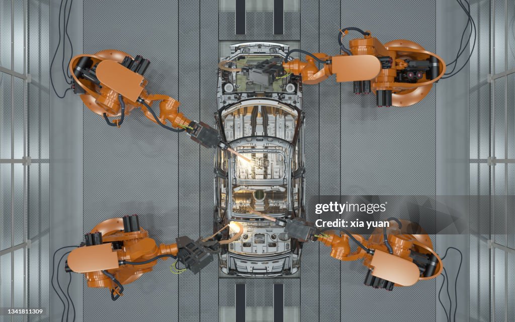 Assembly line of robots welding car body