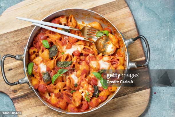 pasta baked in tomato sauce and cheese - casserole stock pictures, royalty-free photos & images