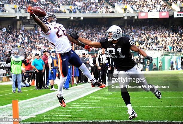 Tim Jennings of the Chicago Bears breaks up this pass into the endzon intended for Chaz Schilens of the Oakland Raiders at O.co Coliseum on November...