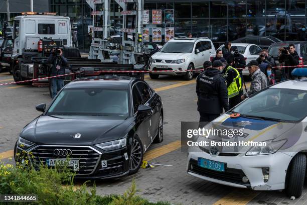 Police examine the car after an apparent assassination attempt against Serhiy Shefir, a top adviser to President Volodymyr Zelensky, on September 22,...