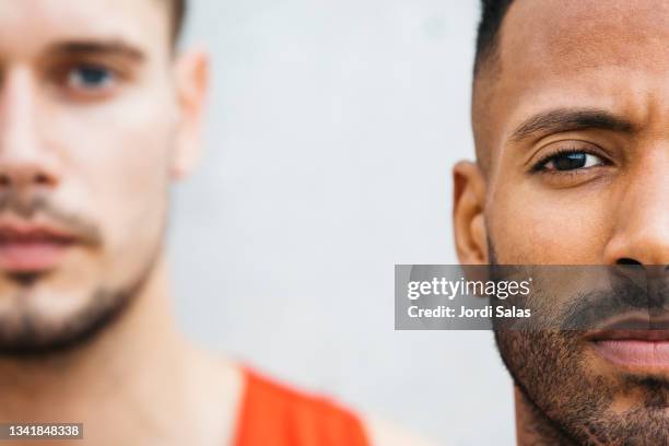 headshot of a latin american man and caucasian man - determination face stock pictures, royalty-free photos & images