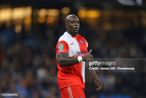 Adebayo Akinfenwa of Wycombe Wanderers F.C. Looks on during the Carabao Cup Third Round match between Manchester City and Wycombe Wanderers F.C. At...