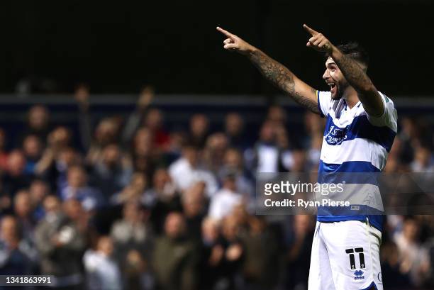 Charlie Austin of QPR celebrates after scoring his penalty during the Carabao Cup Third Round match between Queens Park Rangers and Everton at Loftus...