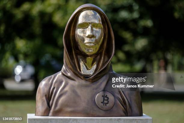 Statue of Satoshi Nakamoto, a presumed pseudonym used by the inventor of Bitcoin, is displayed in Graphisoft Park on September 22, 2021 in Budapest,...