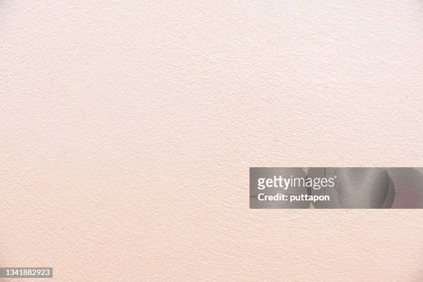 texture and background of creamy white old cement wall - beige background fotografías e imágenes de stock