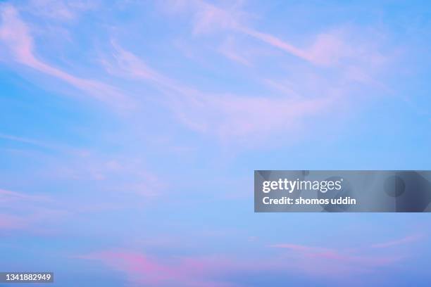 soft pink and blue sky at sunset - blue dramatic sky stock pictures, royalty-free photos & images