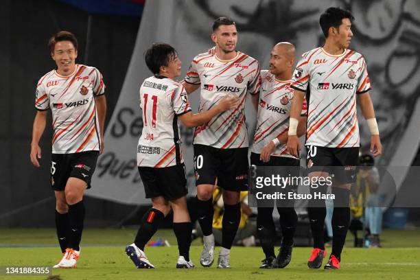 Jakub Swierczok of Nagoya Grampus celebrates scoring his side's first goal during the J.League Meiji Yasuda J1 match between FC Tokyo and Nagoya...