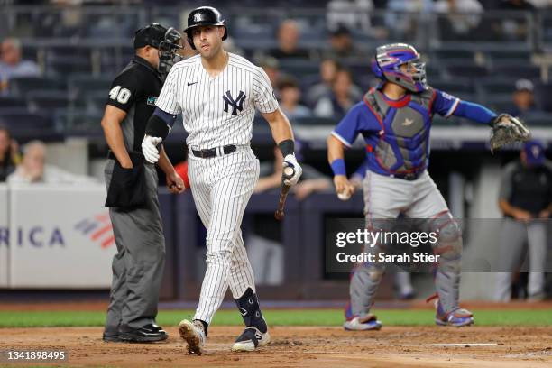 Joey Gallo of the New York Yankees reacts after striking out during the first inning against the Texas Rangers at Yankee Stadium on September 21,...