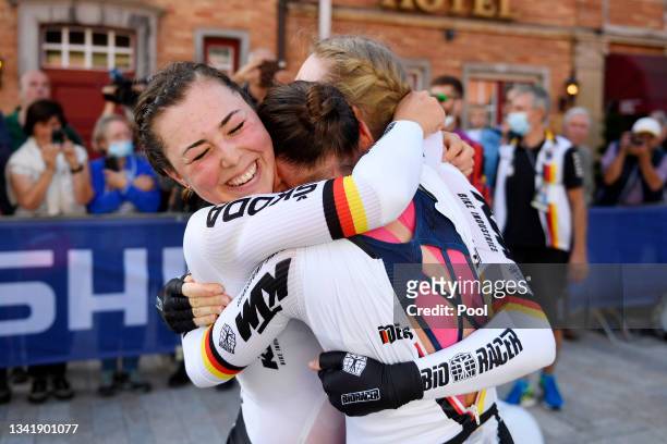 Lisa Klein of Germany, Lisa Brennauer of Germany and Mieke Kroger of Germany and Lisa Brennauer of Germany celebrate winning during the 94th UCI Road...