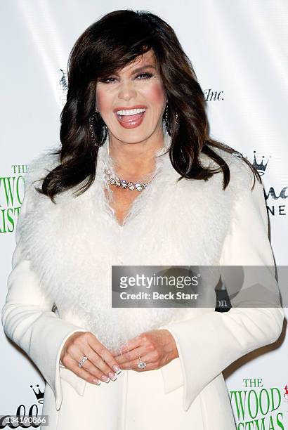 Personality Marie Osmond arrives at The 80th Anniversary Hollywood Christmas Parade benefiting Marine Toys For Tots on November 27, 2011 in...