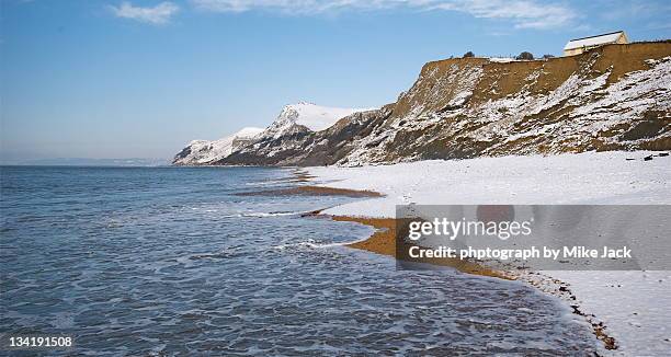 sea waves touching white shore-line - beach england stock pictures, royalty-free photos & images