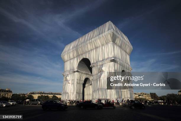 The Arc de Triomphe wrapped in a giant sheet of fabric as part of a project of late Bulgarian-born US artist Christo Javacheff is seen on September...