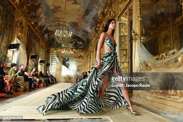 Model walks the runway at the Roberto Cavalli fashion show during the Milan Fashion Week - Spring / Summer 2022 on September 22, 2021 in Milan, Italy.