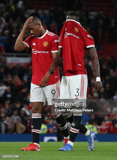Anthony Martial and Eric Bailly of Manchester United show their disappointment after the Carabao Cup Third Round match between Manchester United and...