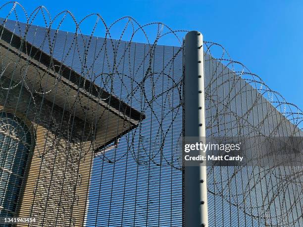 Barbed wire is seen surrounding the old cell block inside what was HMP Shepton Mallet on October 01, 2018 in Somerset, England. When it closed in...