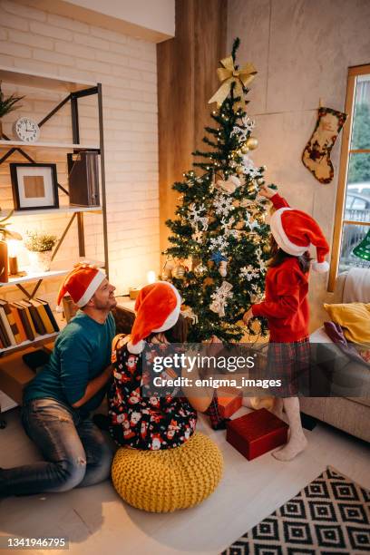 happy family during the holidays - happy holidays family stock pictures, royalty-free photos & images