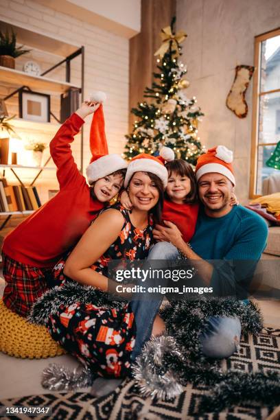 happy family during the holidays - happy holidays family stock pictures, royalty-free photos & images