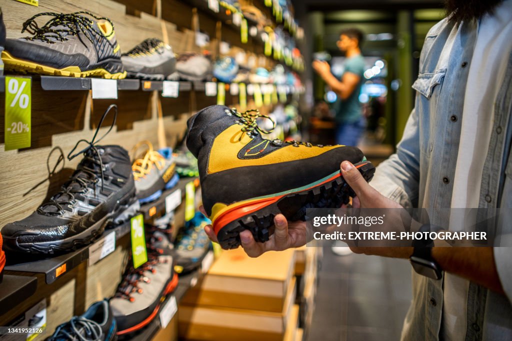 Men shopping in an outdoor store