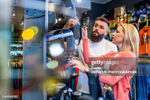 outdoor adventures equipment shop as a small business in a neighbourhood - sports merchandise stock pictures, royalty-free photos & images