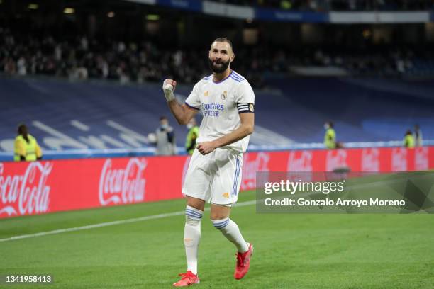 Karim Benzema of Real Madrid CF celebrates scoring their fifth goal during the La Liga Santander match between Real Madrid CF and RCD Mallorca at...