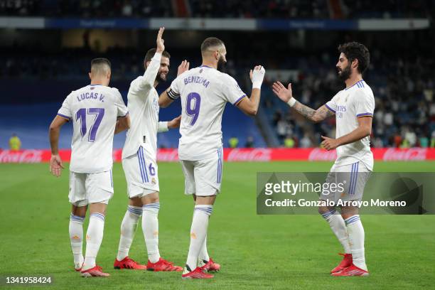 Karim Benzema of Real Madrid CF celebrates scoring their fifth goal with teammates Lucas Vazquez , Nacho Fernández and Francisco Roman Alarcon alias...