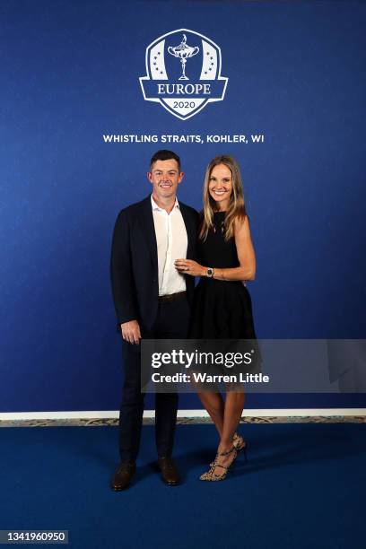 Rory McIlroy of Northern Ireland and team Europe and wife Erica Stoll pose for a photo during the Team Europe Gala Dinner prior to the 43rd Ryder Cup...
