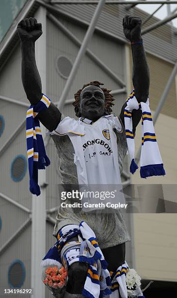 Tributes are left at the Billy Bremner statue outside Elland Road football ground in memory of former player Leeds United Gary Speed on November 28,...