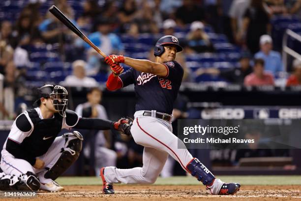 Juan Soto of the Washington Nationals hits a two-run home run during the third inning against the Miami Marlins at loanDepot park on September 22,...