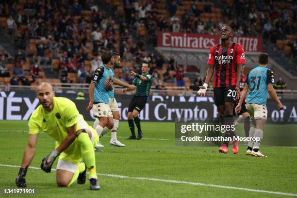 Pierre Kalulu of AC Milan reacts after narrowly shooting wide of the target during the Serie A match between AC Milan and Venezia FC at Stadio...