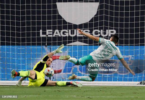 Angel Mena of Leon scores a goal against Stefan Frei of Seattle Sounders during the Leagues Cup 2021 Final at Allegiant Stadium on September 22, 2021...