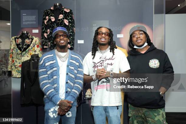 Offset, Quavo and Takeoff of Migos pose with their blazers on display at A Conversation with Migos at The GRAMMY Museum on September 22, 2021 in Los...