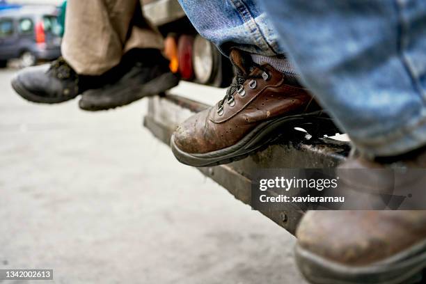 truck drivers taking a break - work boot stock pictures, royalty-free photos & images