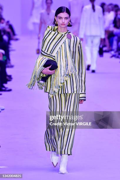 Model walks the runway during the Jil Sander Ready to Wear Spring/Summer 2022 fashion show as part of the Milan Fashion Week on September 22, 2021 in...