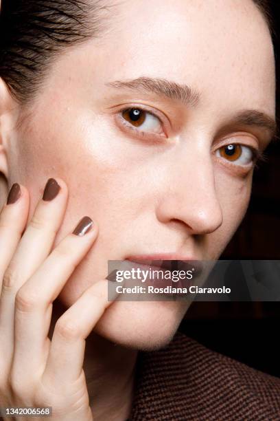 Model , beauty and nails detail, poses in the backstage of the Giada fashion show during the Milan Fashion Week - Spring / Summer 2022 on September...