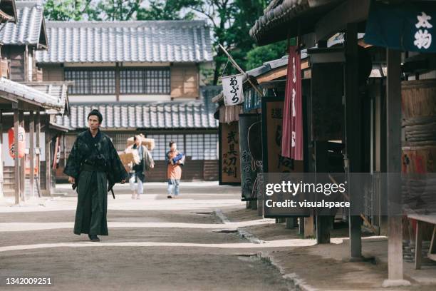 traditional japanese samurai - japanese samurai reenactment stock pictures, royalty-free photos & images