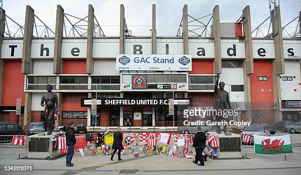 Tributes are left outside Bramall Lane ground in memory of former player and manager Gary Speed on November 28, 2011 in Sheffield, England. Wales...