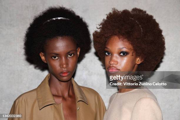 Models pose in the backstage of the Max Mara fashion show during the Milan Fashion Week - Spring / Summer 2022 on September 23, 2021 in Milan, Italy.