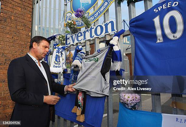 Ex Everton player Graeme Sharp looks at tributes to footballer and ex Everton player Gary Speed outside Goodison Park the home ground of Everton FC...